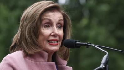 U.S. Representative Nancy Pelosi speaks at a rally opposing House Republicans' tax plans on Capitol Hill May 21 in Washington, D.C.