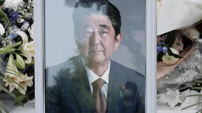 A makeshift memorial for former Japanese prime minister Shinzo Abe is seen at the Liberal Democratic Party in Tokyo on July 11.