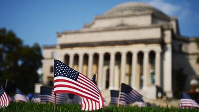 Flags at Columbia University commemorating lives lost on September 11, 2001. Photo credit: Eileen Barroso