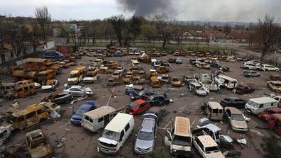 Damaged and burned vehicles at a destroyed metallurgical plant in an area controlled by Russian-backed separatist forces in Mariupol, Ukraine, on April 18, 2022.