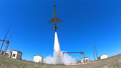 Image of a warplane taking flight