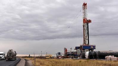 A drilling rig in Lea County, N.M. President Biden plans to sign an executive order today that would pause new oil leases on federal lands. 