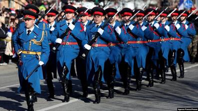 Members of a Bosnian Serb honor guard unit march in the northern Bosnian city of Banja Luka
