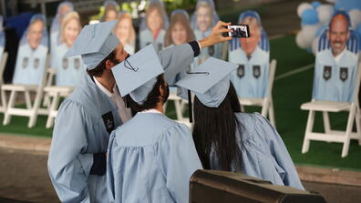 Students take photos on Furnald Lawn