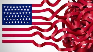 Government red tape concept and American bureaucracy symbol as an icon of the flag of the United States with the red stripes getting tangled in confusion as a metaphor for political inefficiency.