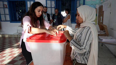 Electoral workers in Tunis. Tunisians must embrace the notion that democracy is unpredictable and occasionally antagonistic