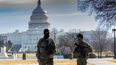 two soldiers in front of the Capitol