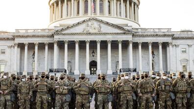 national guard troops stand outside the capitol