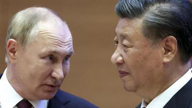 closeup shot of vladimir putin and xi jiping