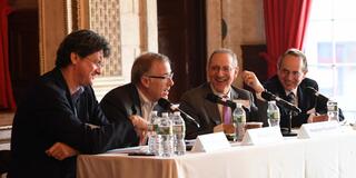 Panelists at a table
