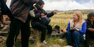 Grudem (right) participates in a ceremony on a local water source that was conserved and improved as part of WFP’s restoration of lives and homes displaced by violence program in Ayacucho, Peru, in March 2016.