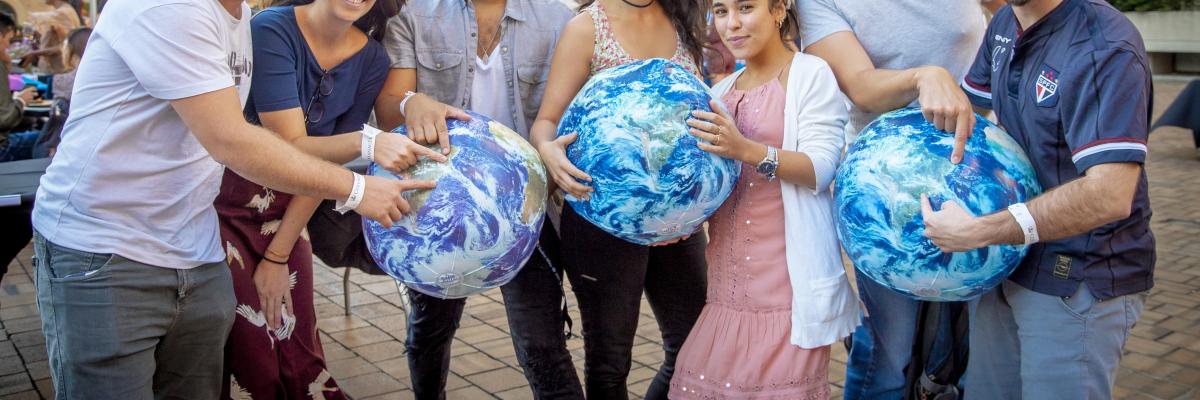 SIPA Student holding Globe