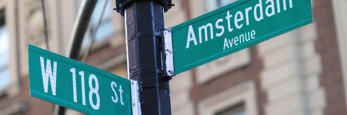 W 118 Street and Amsterdam street signs